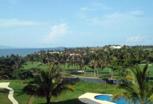 Beautiful view of Pacific Ocean, pool and golf course from terrace.